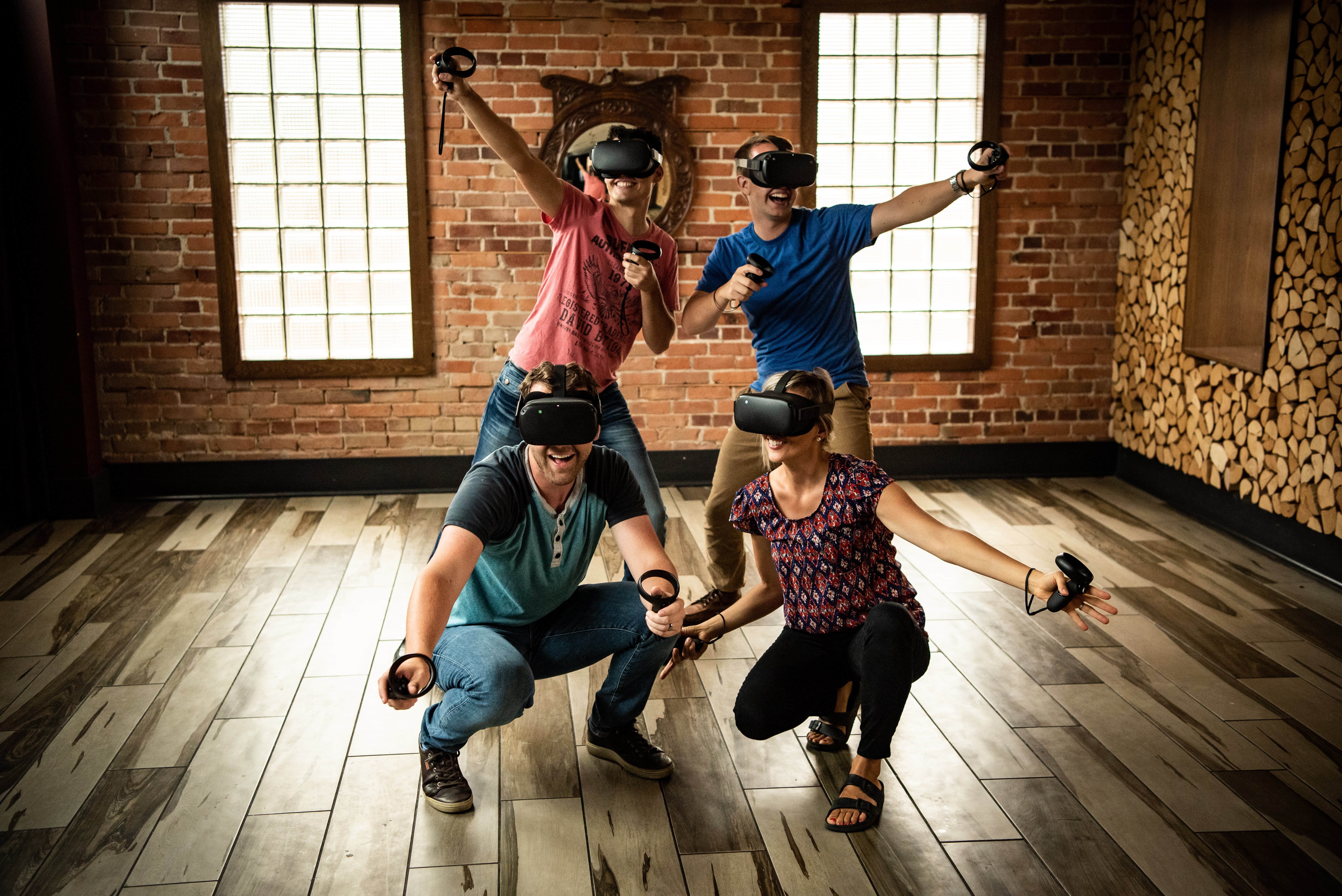 Group of four customers trying VR with Oculus Quest headsets